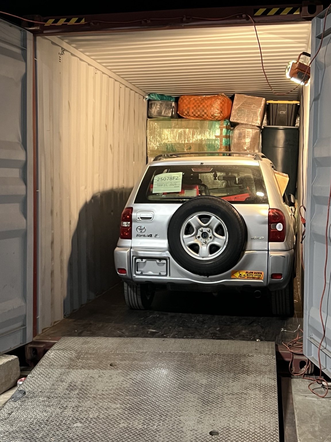Vehicle and cargo inside container